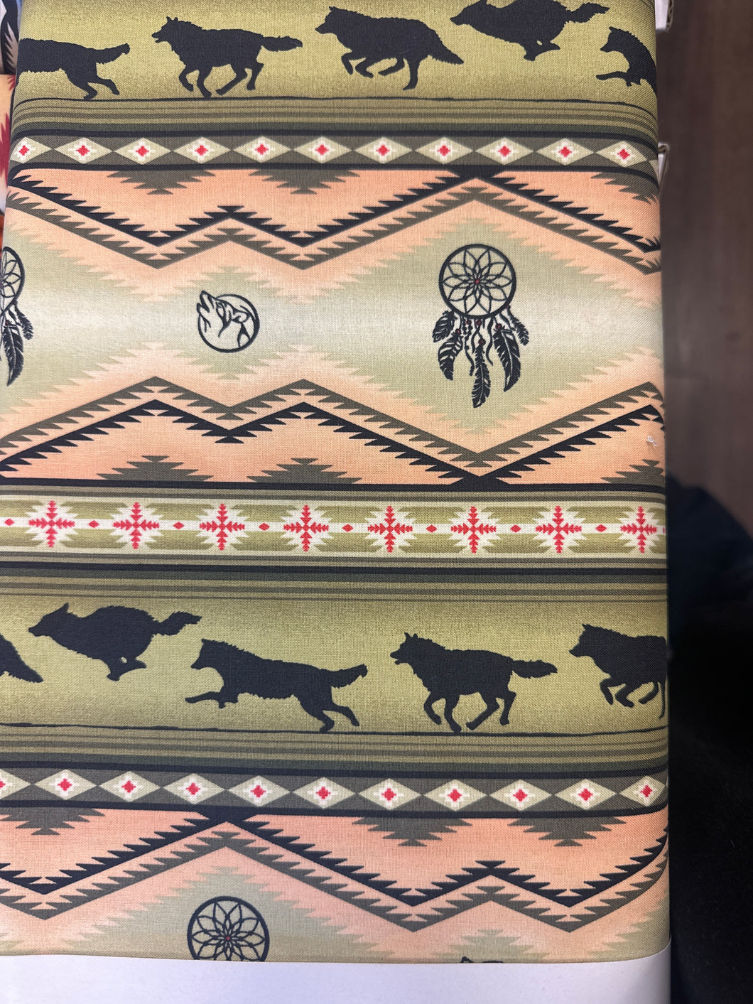 Quilting Cotton green wolves - 1/2 metre
