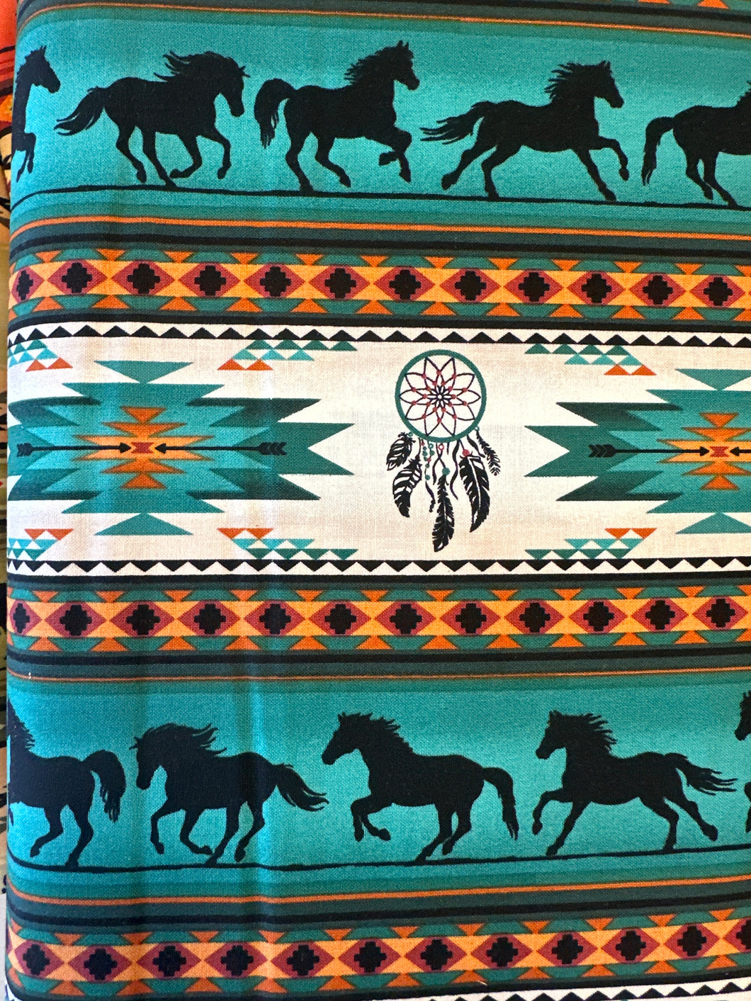 Quilting Cotton turquoise horses - 1/2 metre